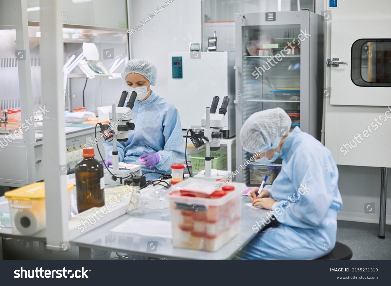 stock-photo-women-work-in-the-lab-conducts-experiments-on-vaccines-2155231319